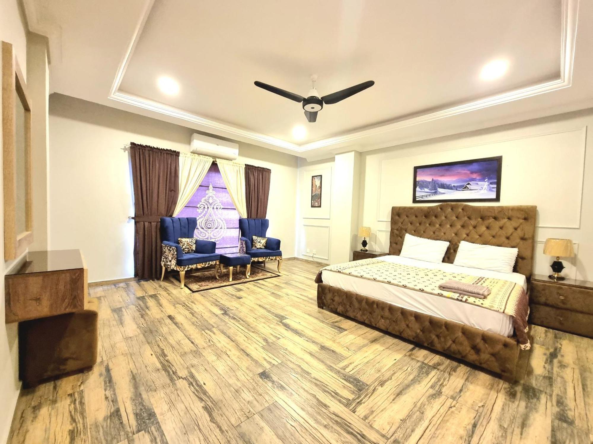 The Millenial Apartments & Suites Bahria Town Rawalpindi Habitación foto