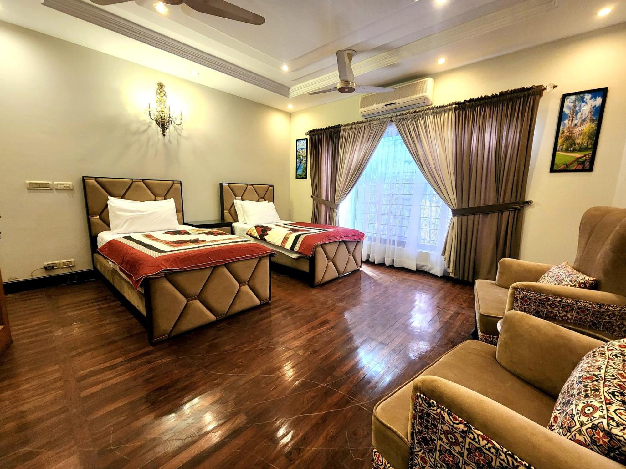 The Millenial Apartments & Suites Bahria Town Rawalpindi Habitación foto
