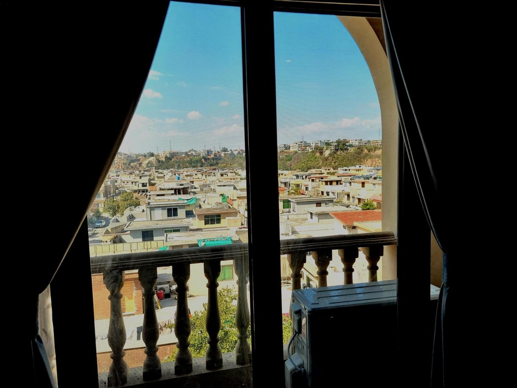 The Millenial Apartments & Suites Bahria Town Rawalpindi Habitación foto
