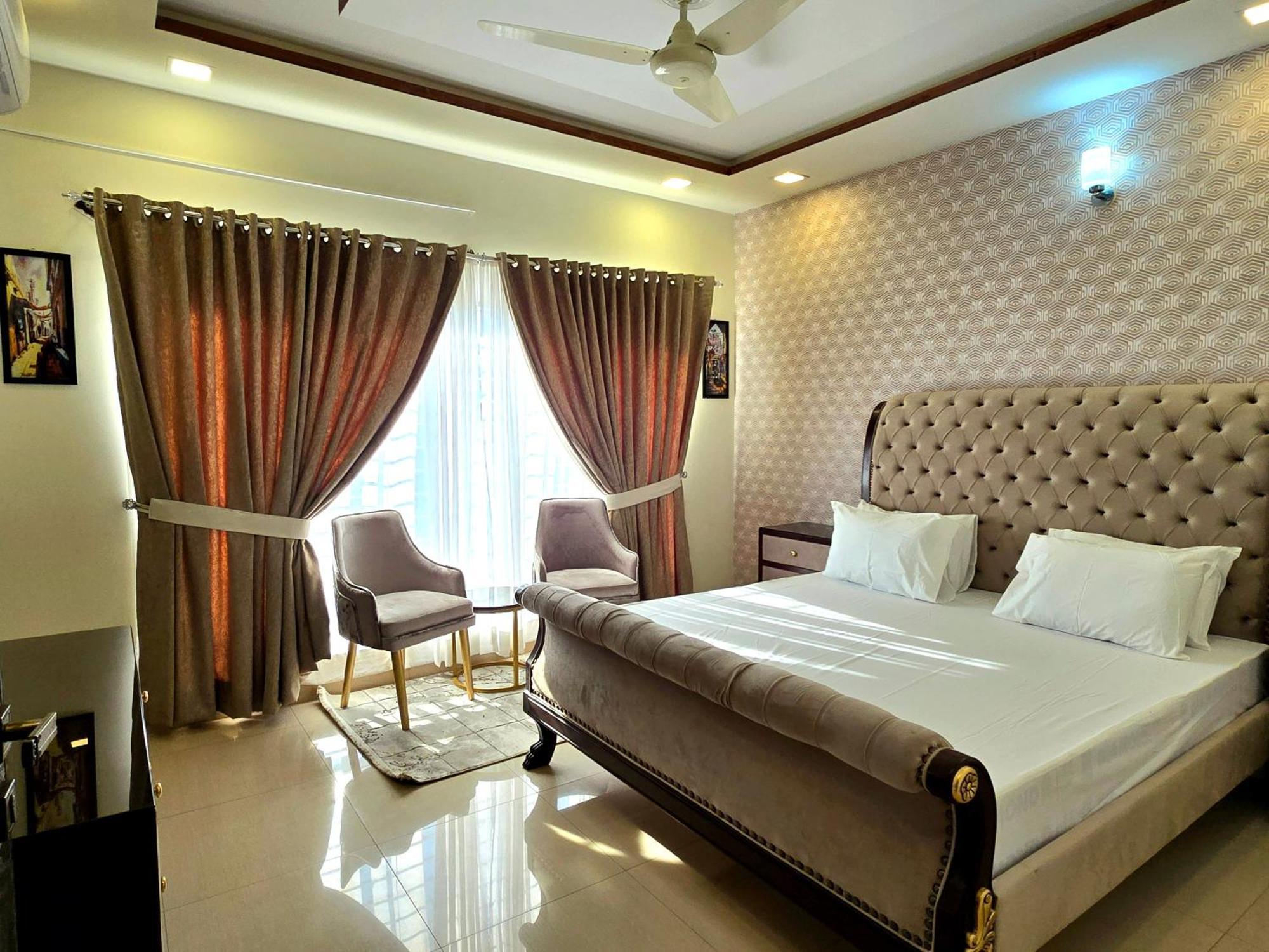 The Millenial Apartments & Suites Bahria Town Rawalpindi Habitación foto
