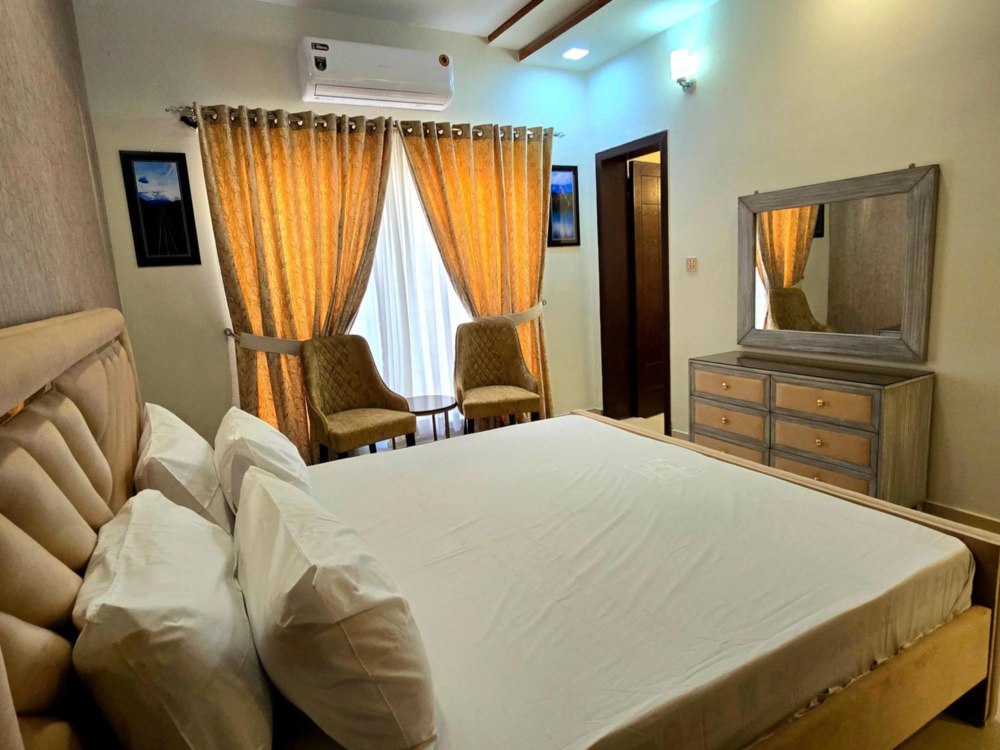 The Millenial Apartments & Suites Bahria Town Rawalpindi Habitación foto