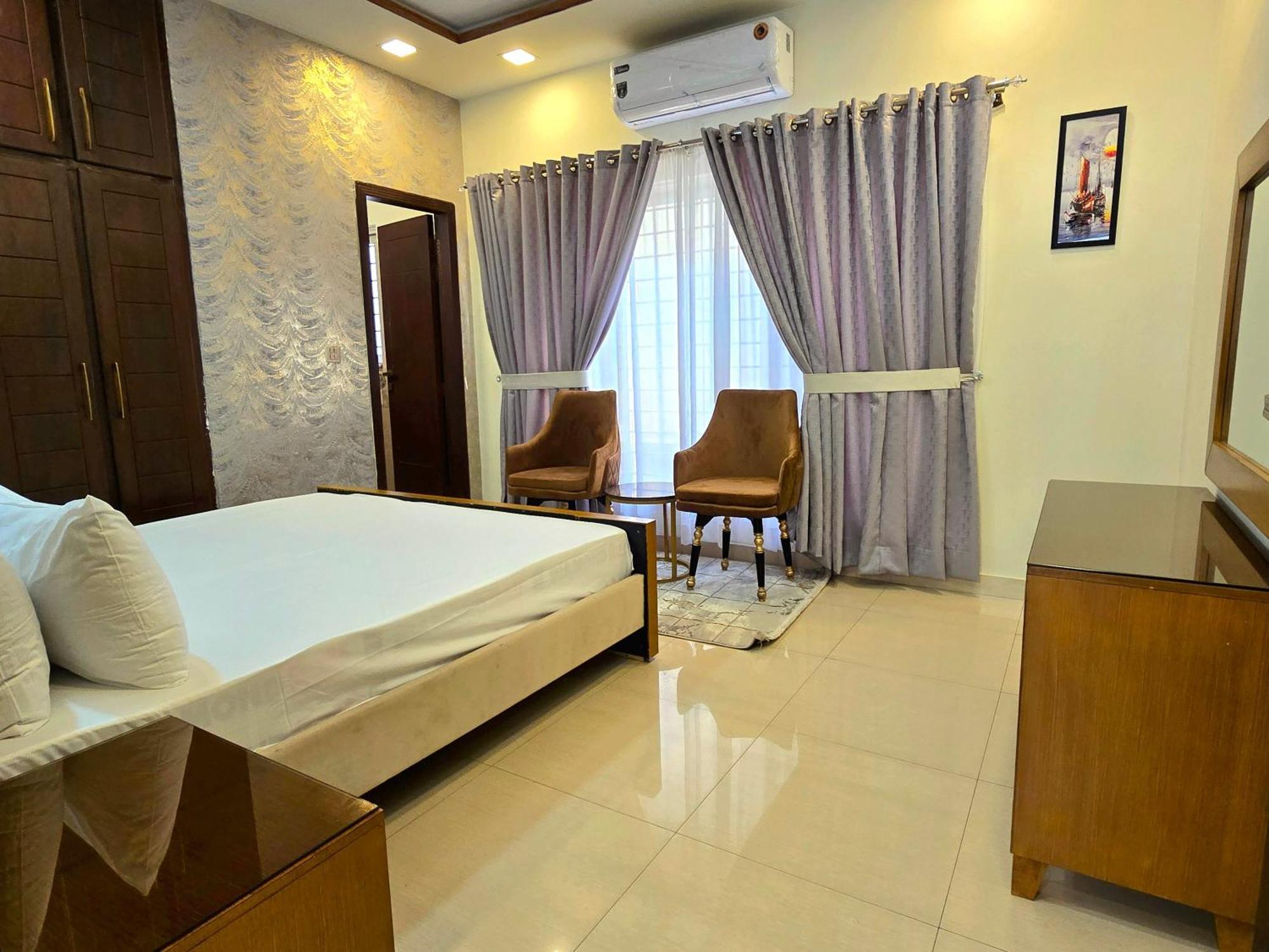 The Millenial Apartments & Suites Bahria Town Rawalpindi Habitación foto